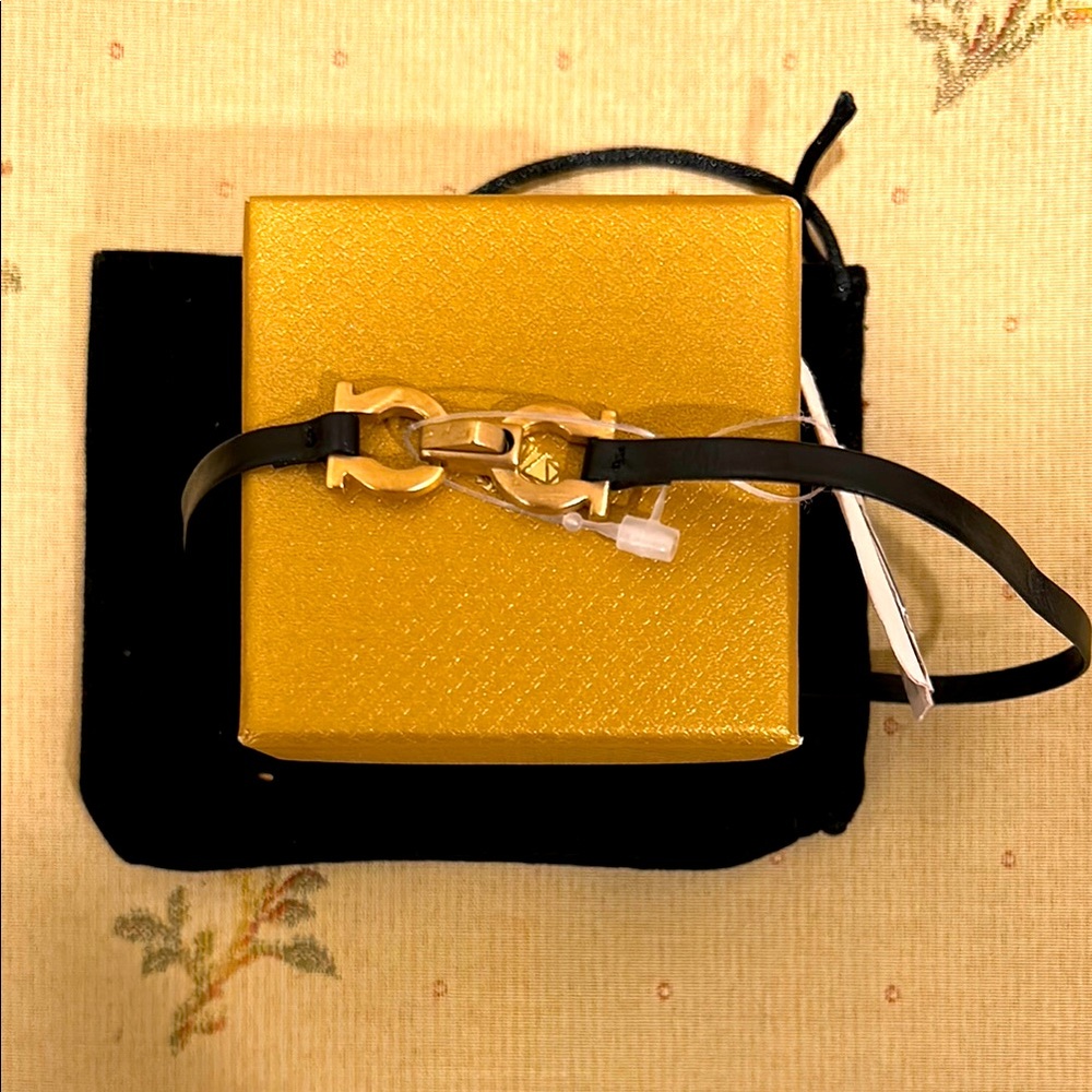 SALVATORE FERRAGAMO Gold and Black Bracelet with Chain Detail